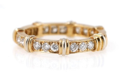 Cartier A diamond ring set with numerousbrilliant-cut diamonds weighing a total of...