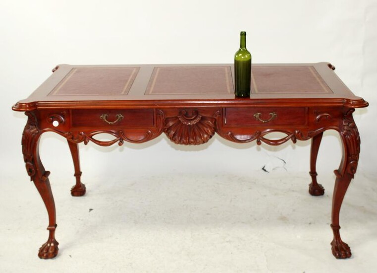 Carved mahogany bureauplat desk with shell