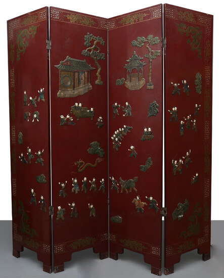 Chinese four-leaf folding screen in lacquered wood with ivory, hard stones and mother-of-pearl inlays, early 20th Century.