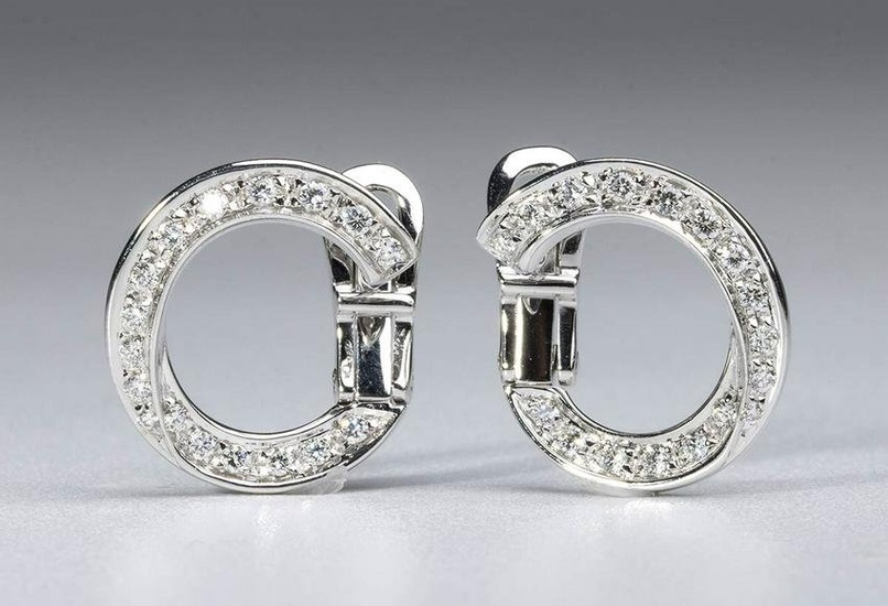 DAMIANI: pair of diamond gold earrings