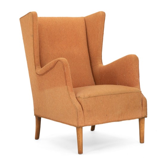 Danish furniture design: Wingback easy chair with round, tapering beech legs. Sides, seat and back upholstered with orange wool.