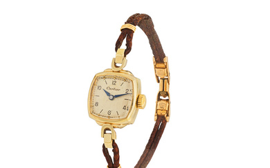 Girard-Perregaux for Cartier. A lady's 14K gold manual wind wristwatch...