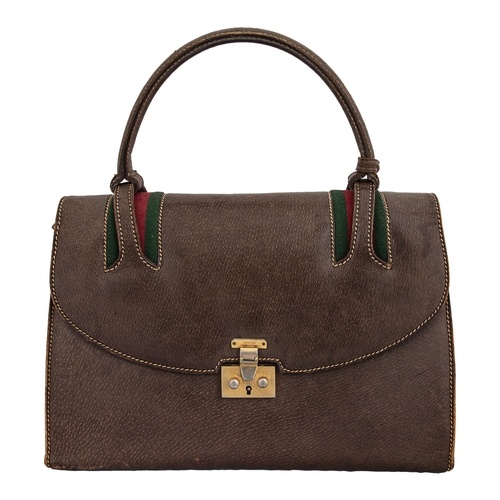 Gucci Circa 1960s A brown leather handbag With single top ha...