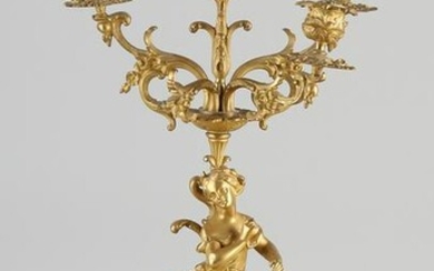 Heavy fire-gilt bronze candlestick with a woman.&#160