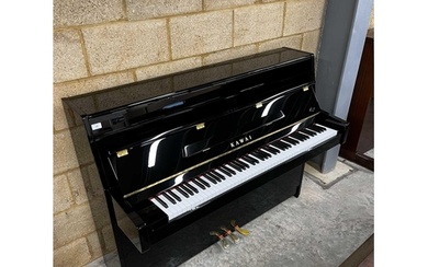 Kawai (c2022) A Model K-15 upright piano in a bright ebonise...
