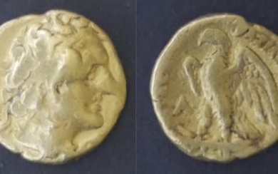 Lagide – Ptolémée Ier (305 avant J.C) 1/10e de statère A : Tête de Ptolémé...