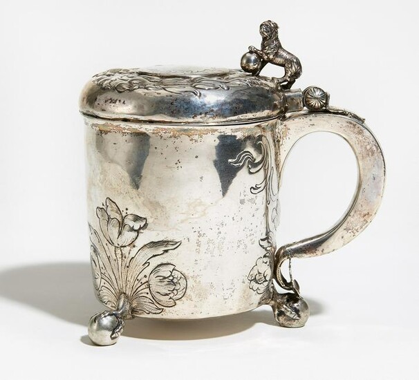 Large silver tankard with gilt interior and ball feet