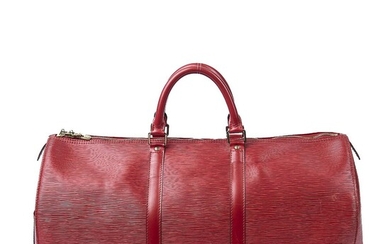 Louis Vuitton A “Keepall 50” travel bag of red Epi leather with...