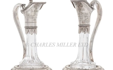 [M] A PAIR OF GERMAN SILVER-MOUNTED ROYAL PRESENTATION CUT GLASS CLARET JUGS, CIRCA 1869