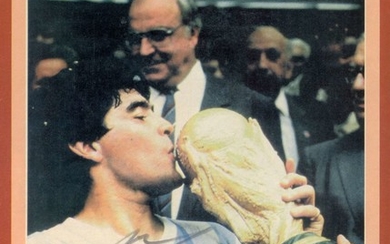 MARADONA DIEGO : (1960- ) Argentinean Footballer. Signed colour 8 x 11 paper photograph by Maradona,...