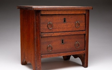 MINIATURE CHEST OF DRAWERS.