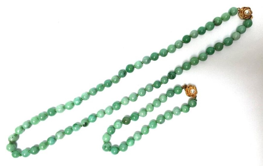 Necklace and bracelet made of jade balls. China,...
