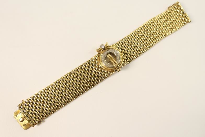 Omega lady's 18ct gold and diamond cocktail watch, signed...