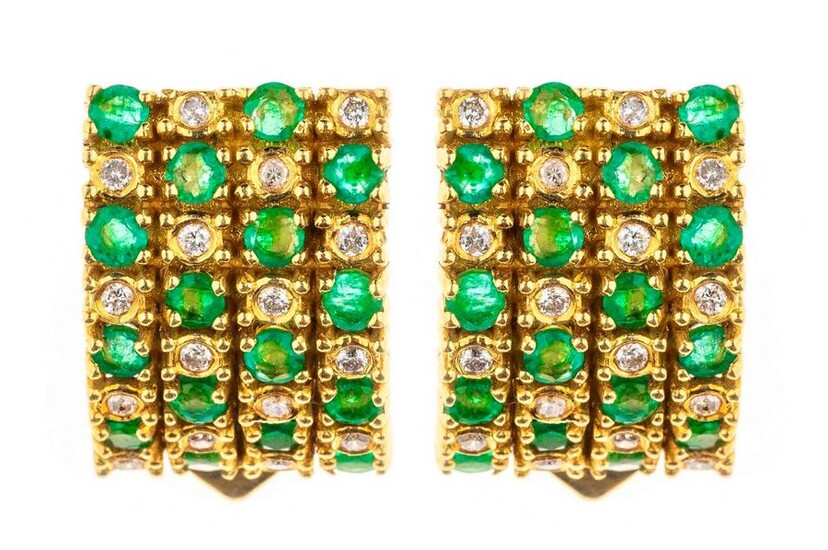 Pair of gold ear clips set with emeralds and brilliants. Gross weight: 10.1 g