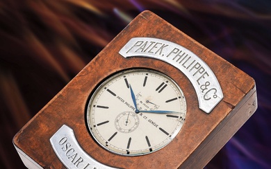 Patek Philippe, An interesting and rare chromium plated desk clock with hack feature, power reserve, observatory movement with Guillaume balance and walnut presentation box, retailed by Oscar Linke