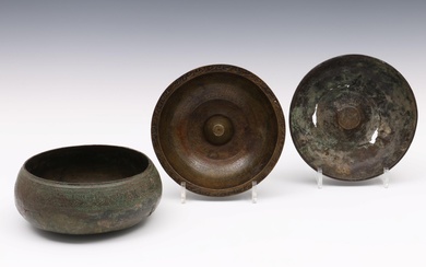 Persia, three bronze magic bowls, two bronze bowls with elevated middle, possibly Salavid, 17th century and a Persian bowl Qajar