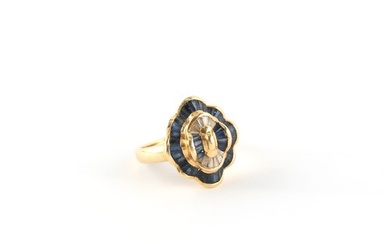 Property of a deceased estate - an 18ct yellow gold ring set...