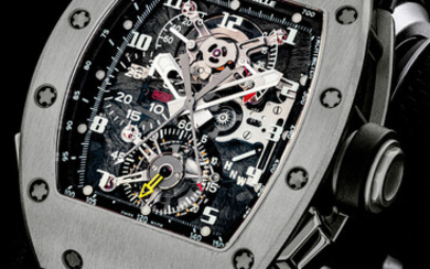 RICHARD MILLE. A TITANIUM SKELETONISED TOURBILLON SPLIT-SECONDS CHRONOGRAPH WRISTWATCH WITH POWER RESERVE AND TORQUE INDICATION