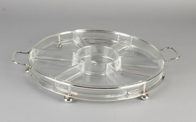 Round glass serving dish with distribution boxes placed