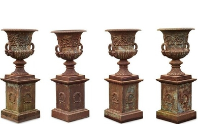 SET OF FOUR CAST IRON GARDEN URNS AND PLINTHS 20TH