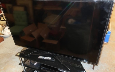 Samsung 55 inch flat screen TV with three tier...