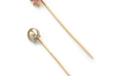 Set of two ancient pins in yellow gold: - one in the shape of a four-leaf clover set with rubies