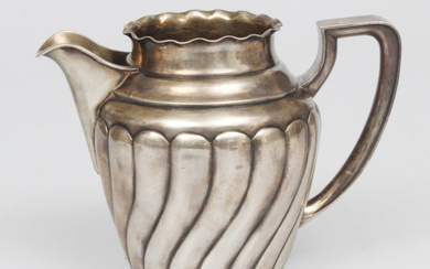 Silver milk jug Beginning of 20th century. Gilding. Height 9.5 cm. Weight 153 g.