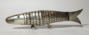 Silver spice box in the shape of a fish.