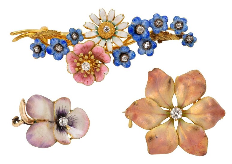 Three early 20th century diamond and vari-coloured enamel brooches, one designed as a floral spray of a rose, daisy and forget-me-nots each flower centring on an old-cut diamond, signed T B STARR NY, one designed as a single Pansy flower with...