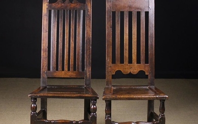 Two Early 18th Century Joined Oak Slat Back Side Chairs with shaped cresting rails and plank seats i