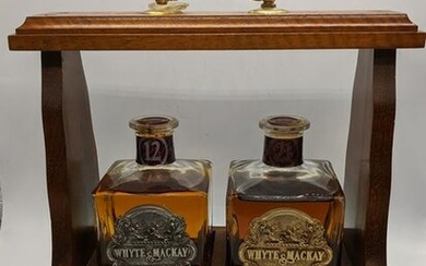 Two White & Mackay half bottles of whiskey, a 21 year