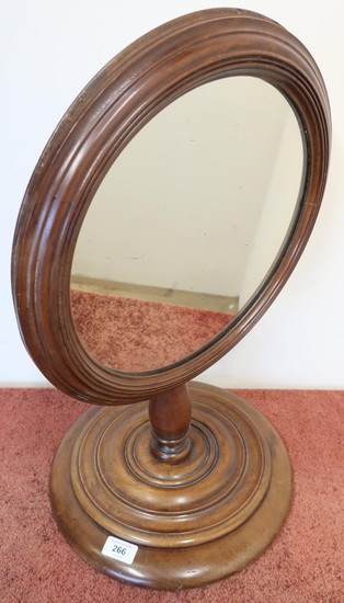 Victorian mahogany circular toilet mirror on turned circular...