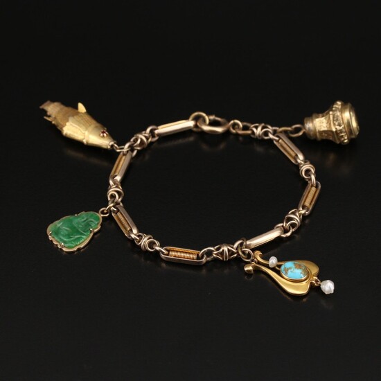 Vintage 14K Charm Bracelet with Articulated Fish, Fob and Jadeite Buddha Charms