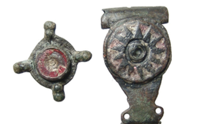 A pair of Roman enameled bronze plate brooches