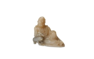 A SMALL CHINESE SOAPSTONE FIGURE OF A LOHAN.