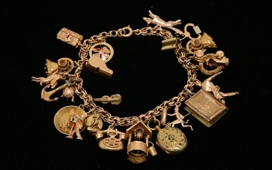 14K gold charm bracelet with chain with numerous charms