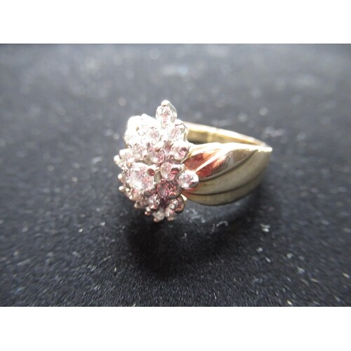14ct yellow gold cluster ring with central round cut diamond...