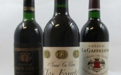 11 bouteilles 1 bt : CLOS FOURTET 1993 1er GCC (B) Saint Emilion (étiquette fanées)