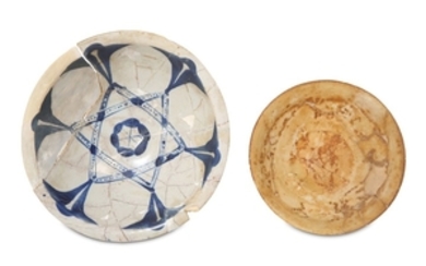 AN ABBASID BLUE AND WHITE POTTERY DISH AND...