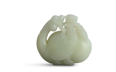 A CHINESE PALE JADE CARVING...