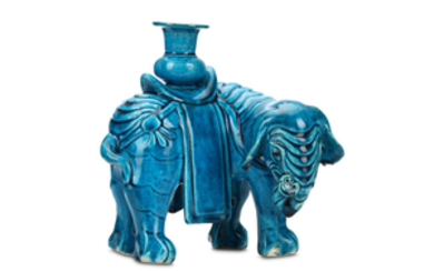 A CHINESE TURQUOISE-GLAZED MODEL OF AN ELEPHANT. Qing...