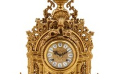 A French Gilt Metal Mantel Clock Height 24 inches.