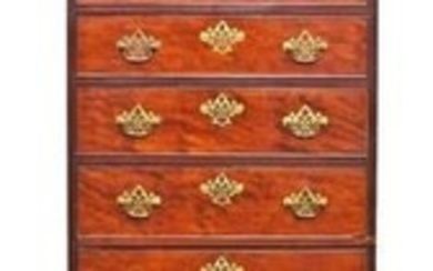 A Georgian mahogany tallboy the cornice with castellated frieze over eight graduated drawers, pierced brass mounts and handles,...