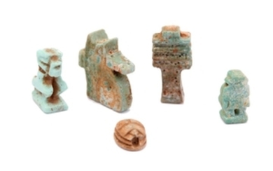 A GROUP OF EGYPTIAN GLAZED COMPOSITION AMULETS Including...