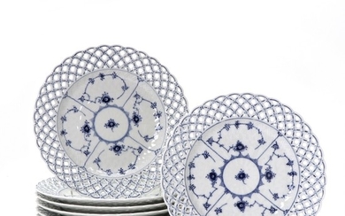 Blue Fluted Full Lace" a set of eight porcelain plates decorated in blue. 1098. Royal Copenhagen. Diam. 26 cm.