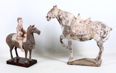 Two Chinese pottery horses, one with rider, Tang...