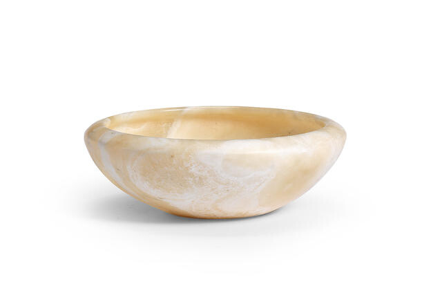 An Egyptian alabaster bowl