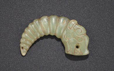 A RARE GREENISH-YELLOW JADE DRAGON-SILKWORM PENDANT, LATE SHANG-WESTERN ZHOU DYNASTY, 11TH-9TH CENTURY BC