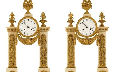 Pair of neoclassical style table pendulum clocks