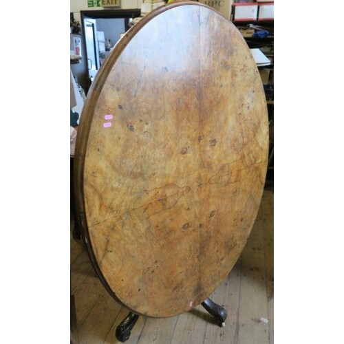 A 19th century walnut oval quarter veneered loo table, raise...